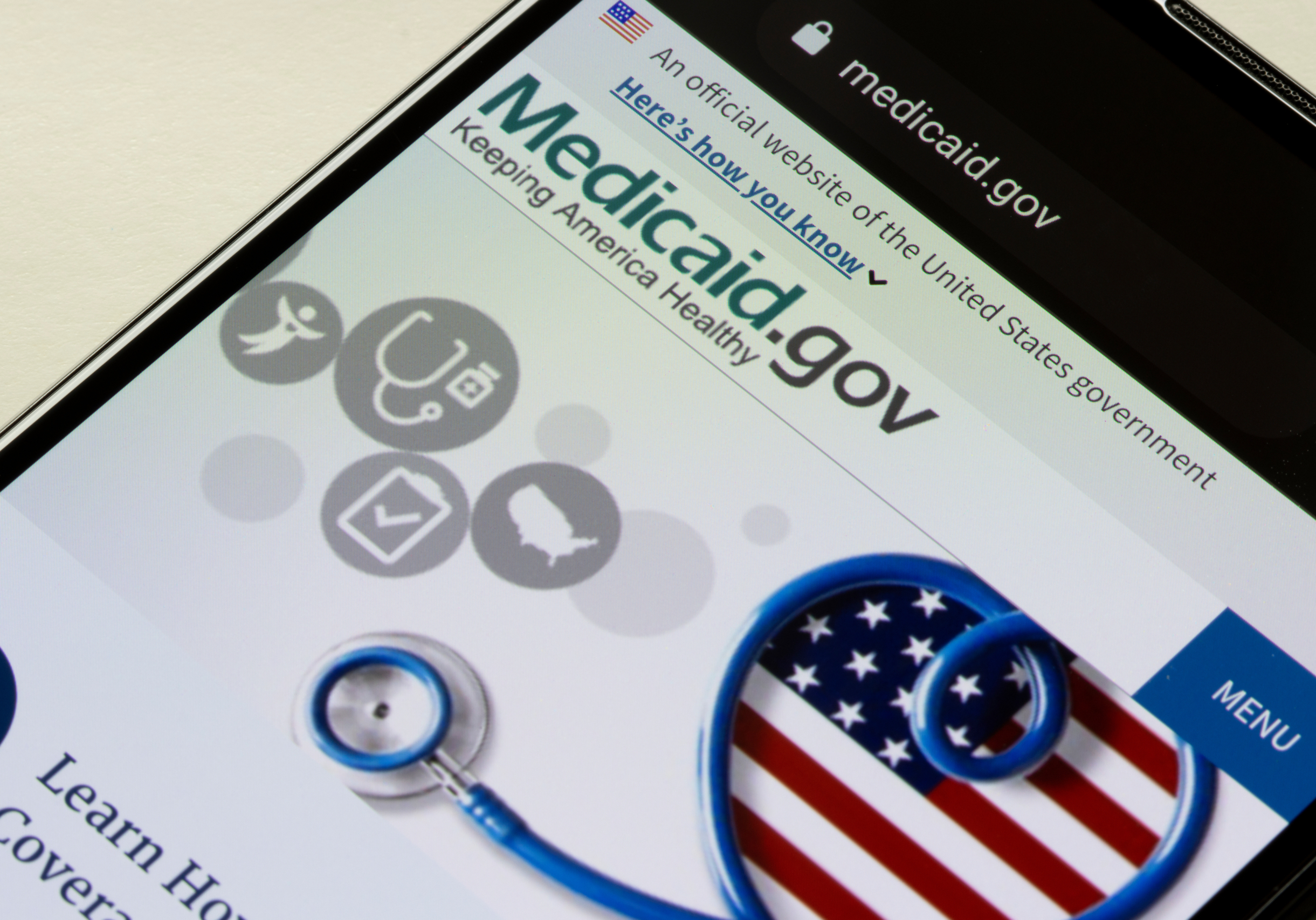 Portland, OR, USA - Nov 29, 2021: Closeup of the homepage of Medicaid.gov seen on a smartphone. Medicaid provides free or low-cost health coverage to eligible needy persons.